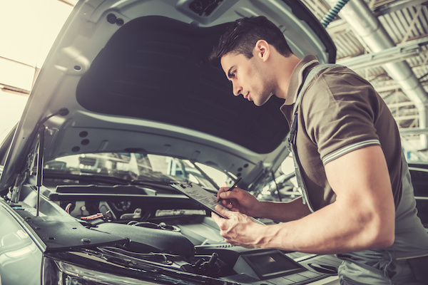 Technician Performing Pre-Purchase Inspection | Roesbery Car Care in Walnut Creek, CA